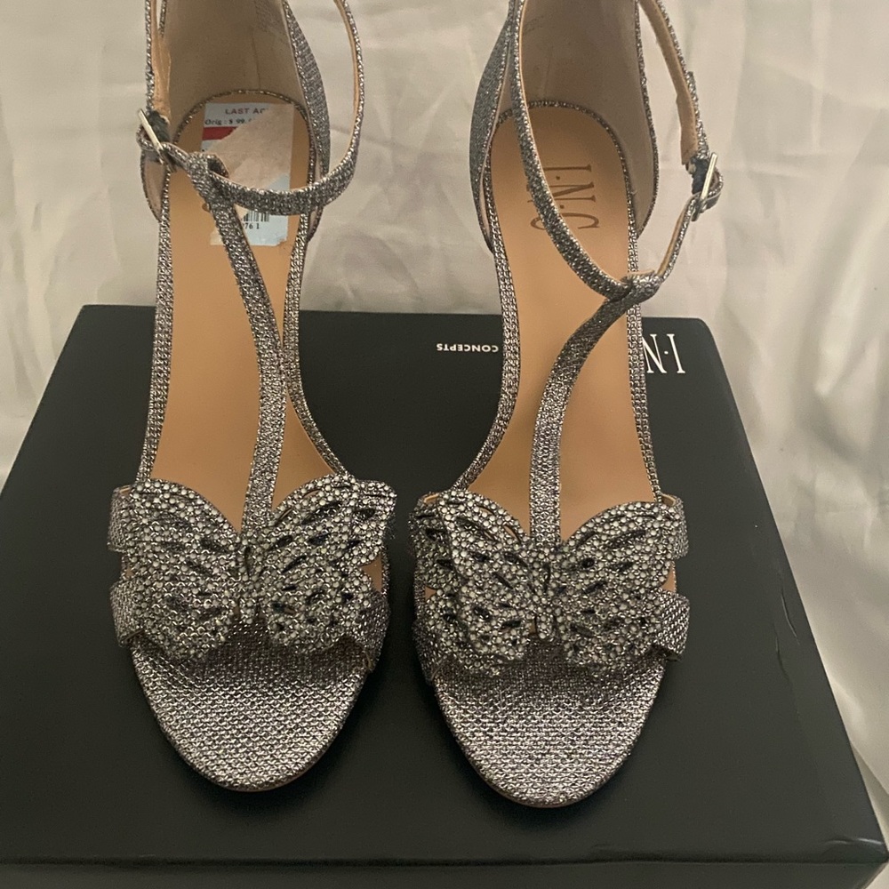 Brand new T strap heels with butterfly detail